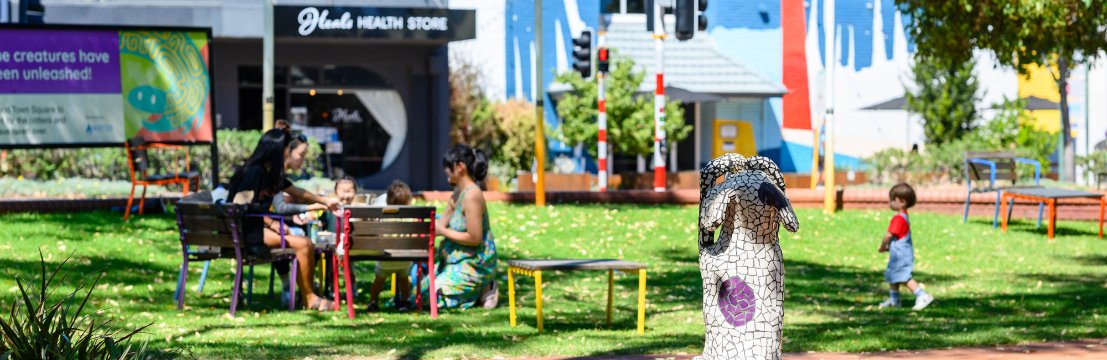 Image of community members having a picnic at Ingelwood Community Hub